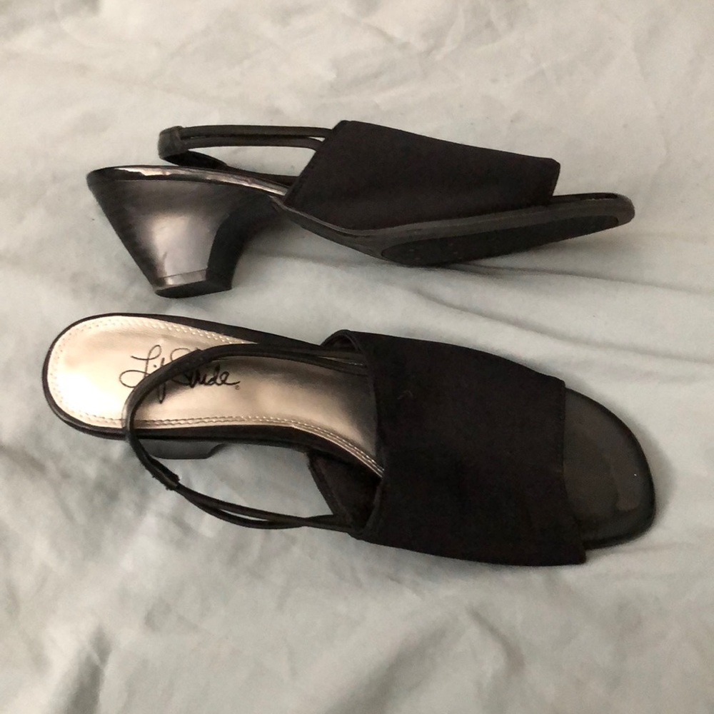 Never worn black heels.